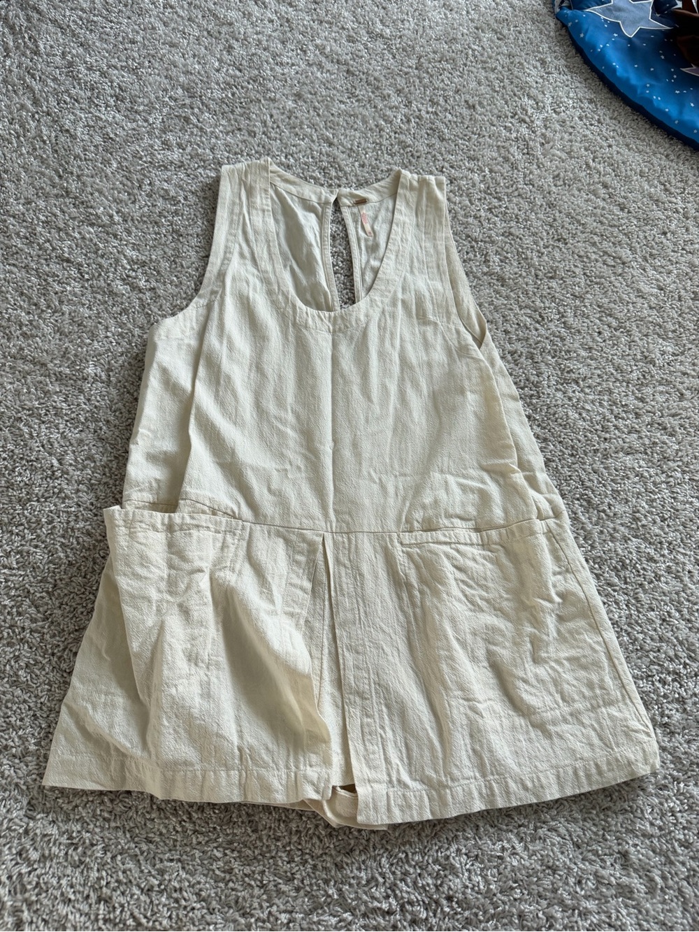 Cream Sleeveless Tunic Top with Front Pockets